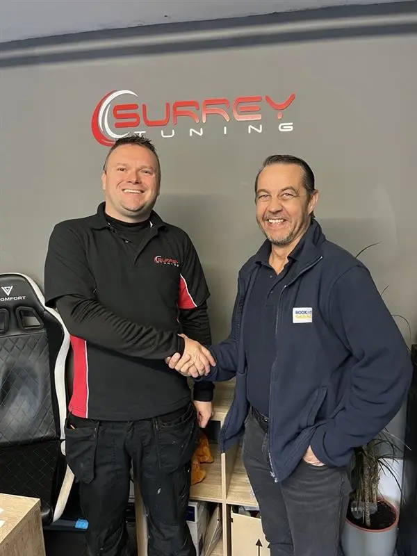 BookMyGarage employee shaking hands with garage owner of Surrey Tuning